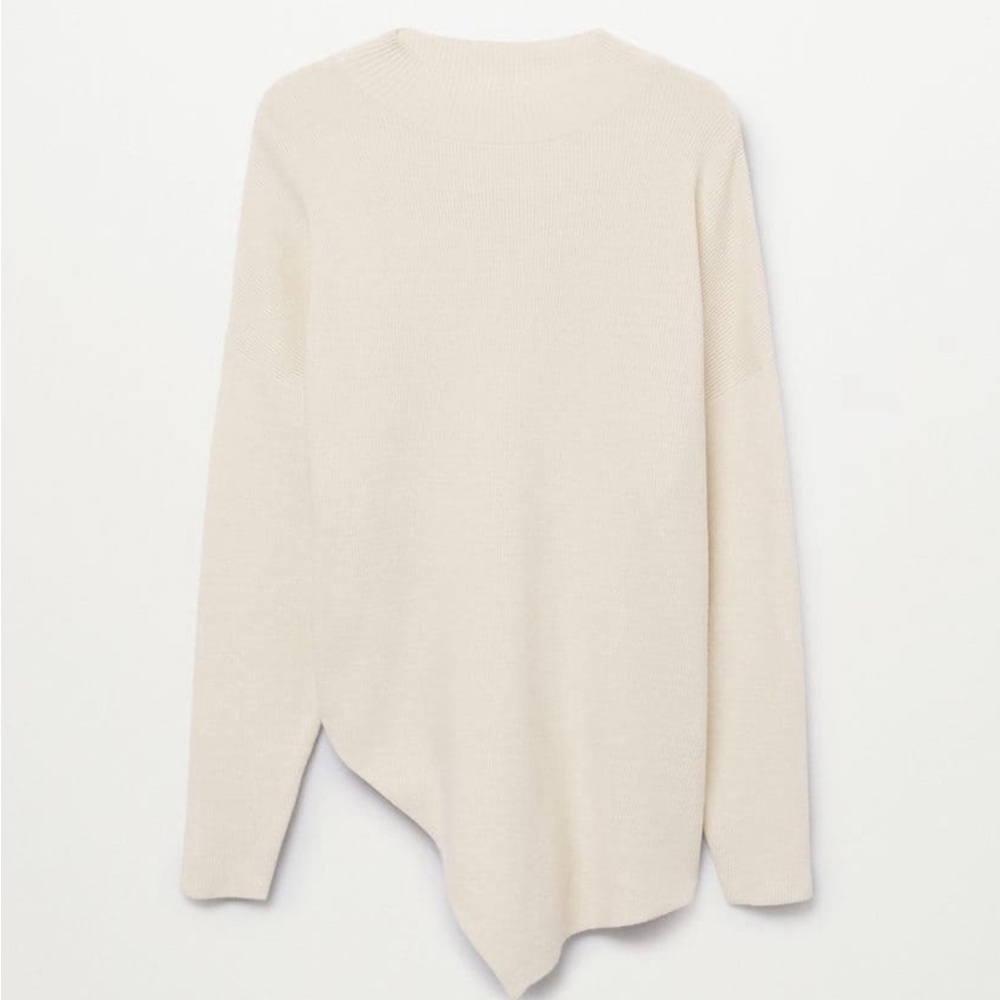 Asymmetric knit sweater in ecru. Size M. Like new.